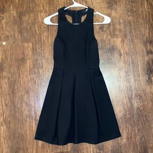 Lulus Black dress with cut out on back.